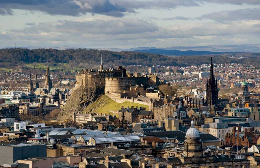 Property investment Edinburgh. A photo of Edinburgh with the castle prominent in the foreground.